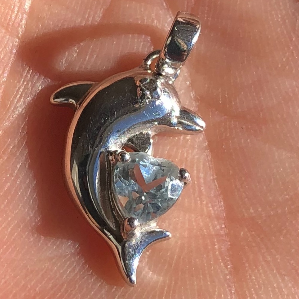 Sterling silver blue topaz dolphin pendant